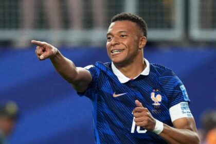 Kylian Mbappé scores twice as France secure World Cup knockout place with 3-0 victory over Iraq