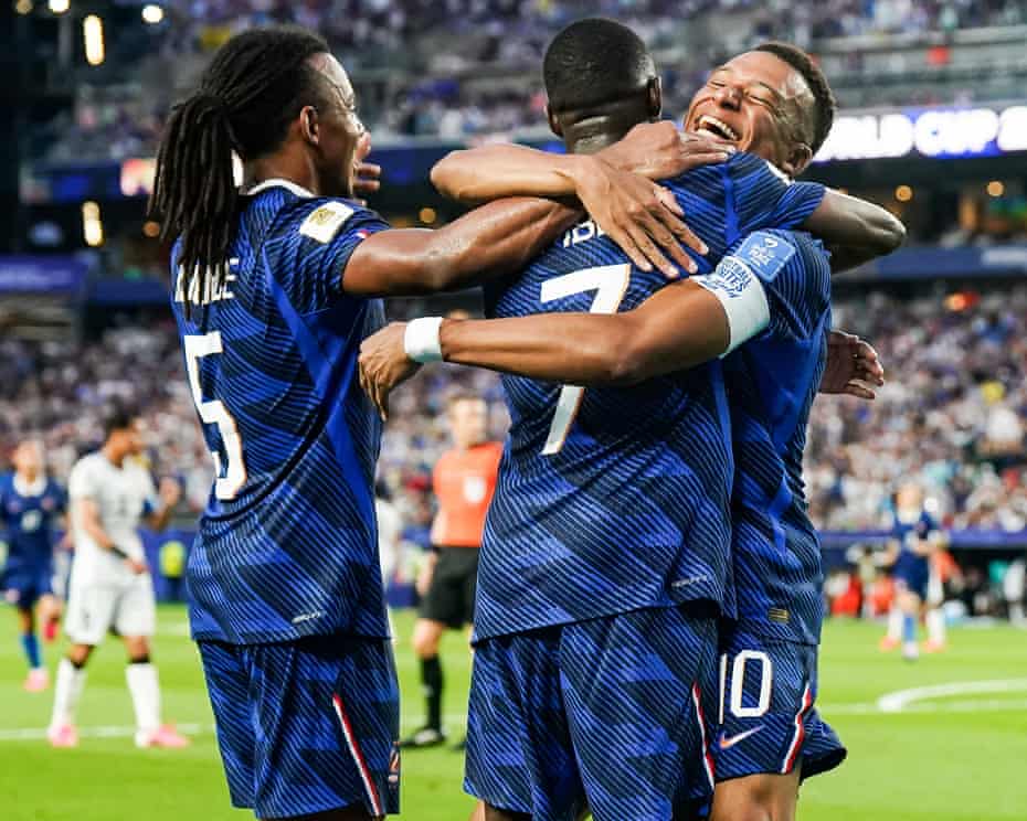 Kylian Mbappé scores twice as France secure World Cup knockout place with 3-0 victory over Iraq