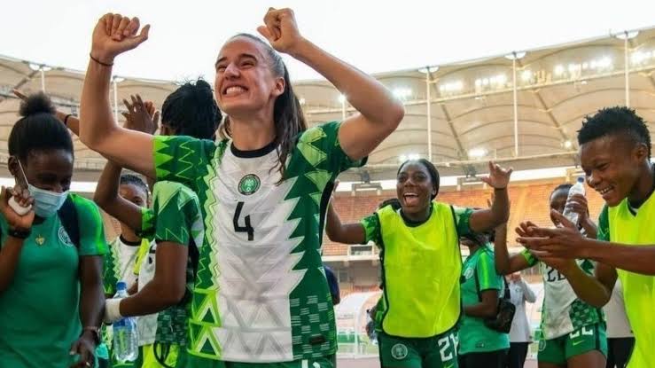 Ashleigh Plumptre celebrating with her Super Falcons teammates