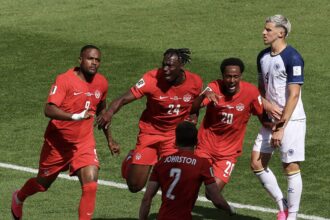 Super-sub Cyle Larin earns Canada historic point in World Cup opener
