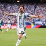 Lionel Messi fires past Miroslav Klose to claim World Cup goals record