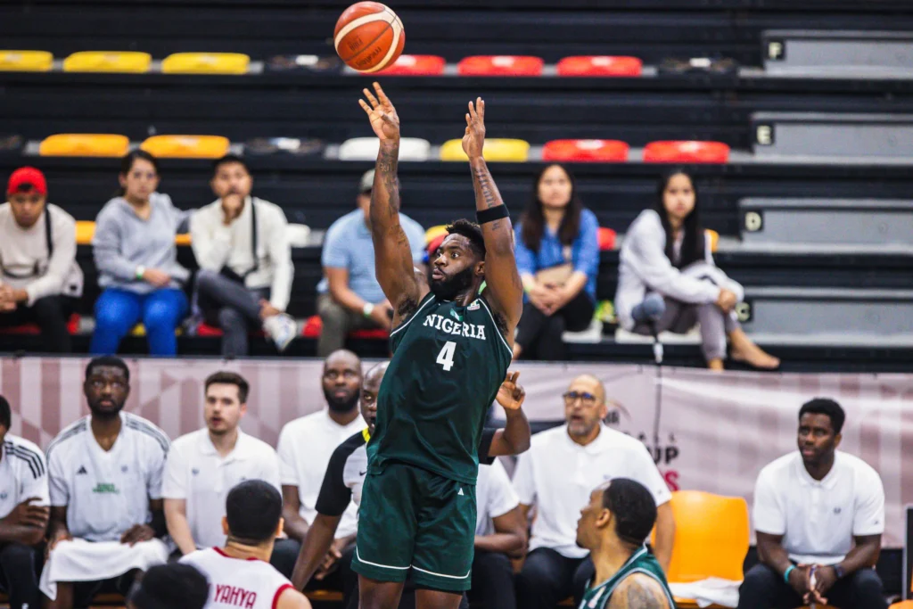 D'Tigers' Daniel Utomi attempts a jump shot