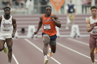 Kanyinsola Ajayi competes in the men’s 100m after breaking Nigeria’s national record