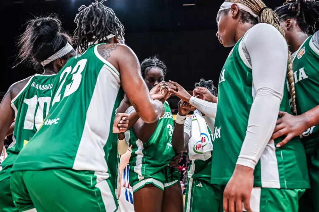 D'Tigress players huddle-up after the loss
